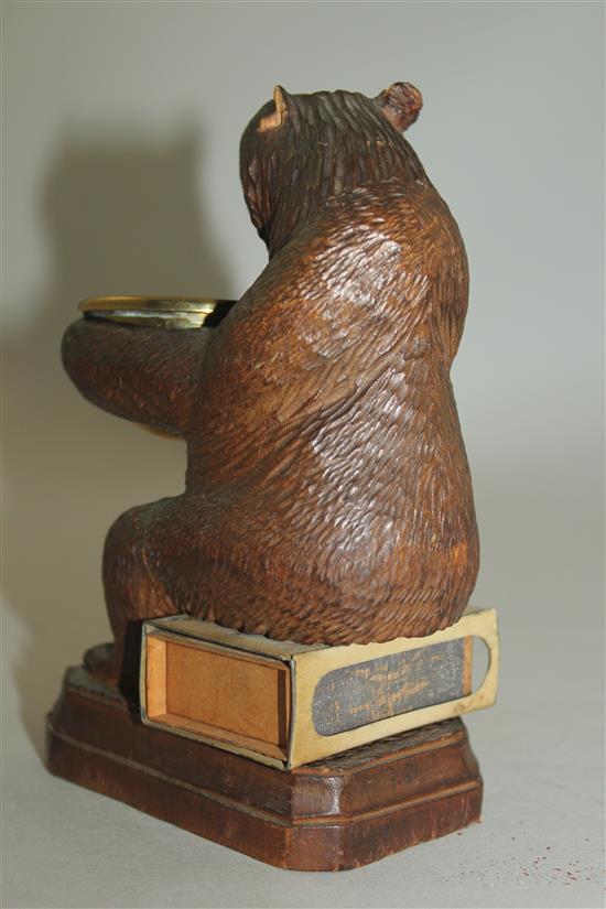 A Black Forest carved bear match tidy, 5.5in.